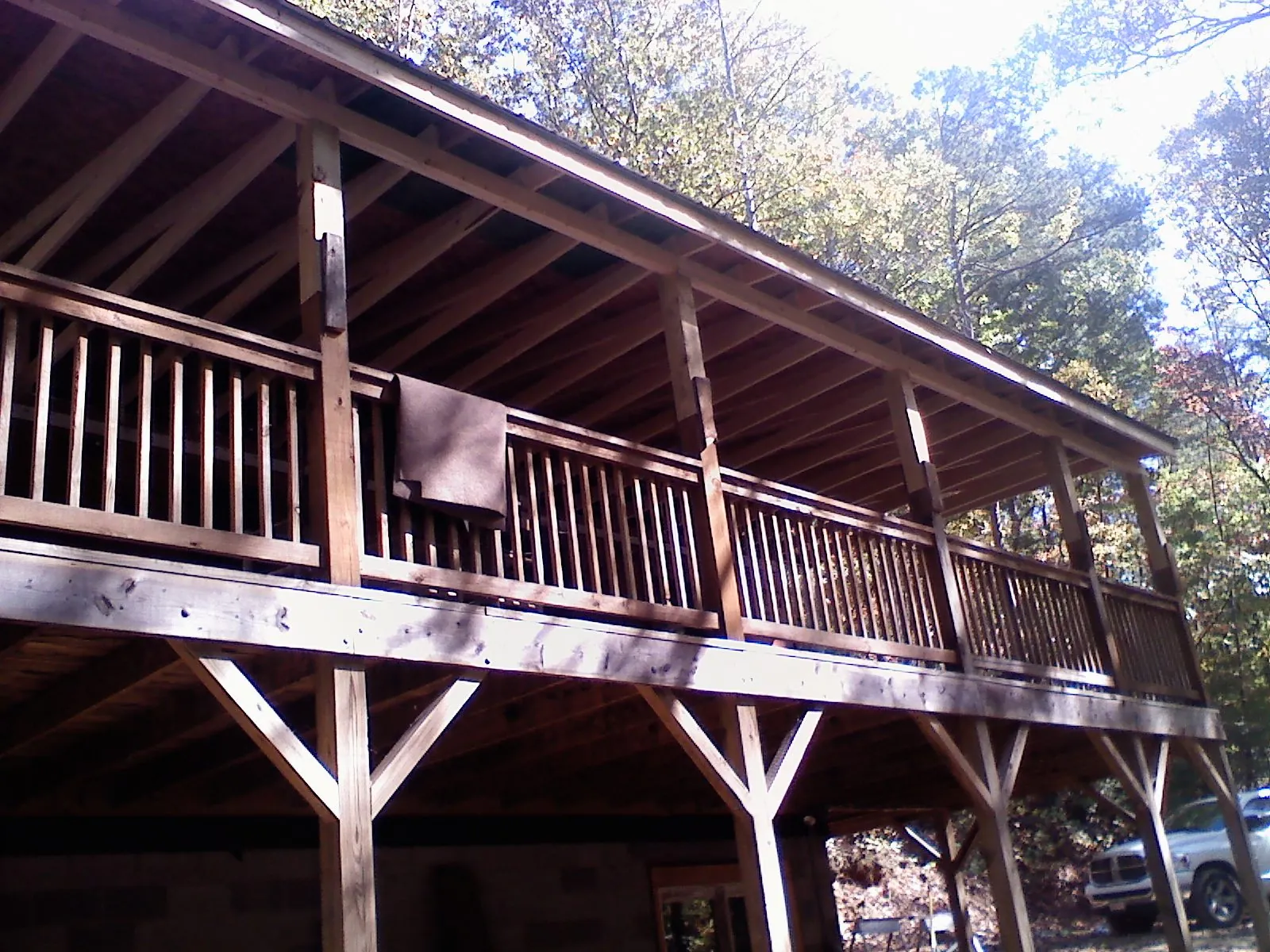 Timber framing under a new elevated porch and deck — Roof Leak Repair in Moreno Valley by Roofing Brothers